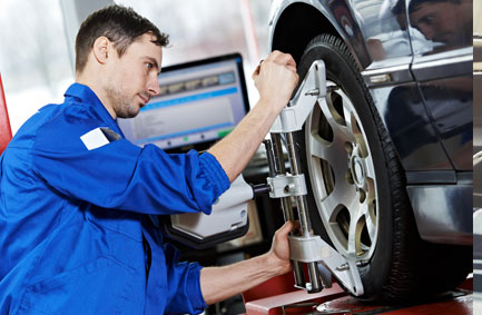 Mechanic Adjusting Automobile Wheel